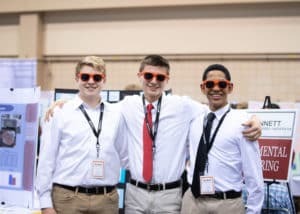 students in a group smiling